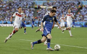 Messi fights for the ball against Germany